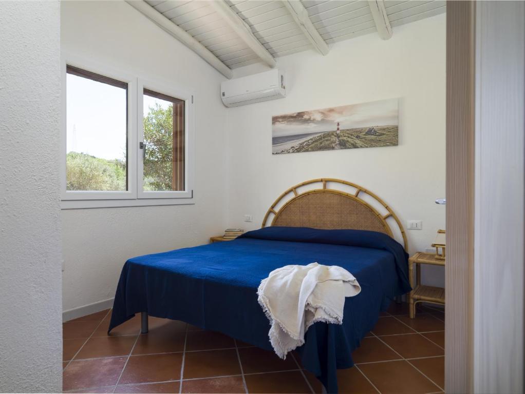 A bed or beds in a room at Laura's Terrace - Klodge