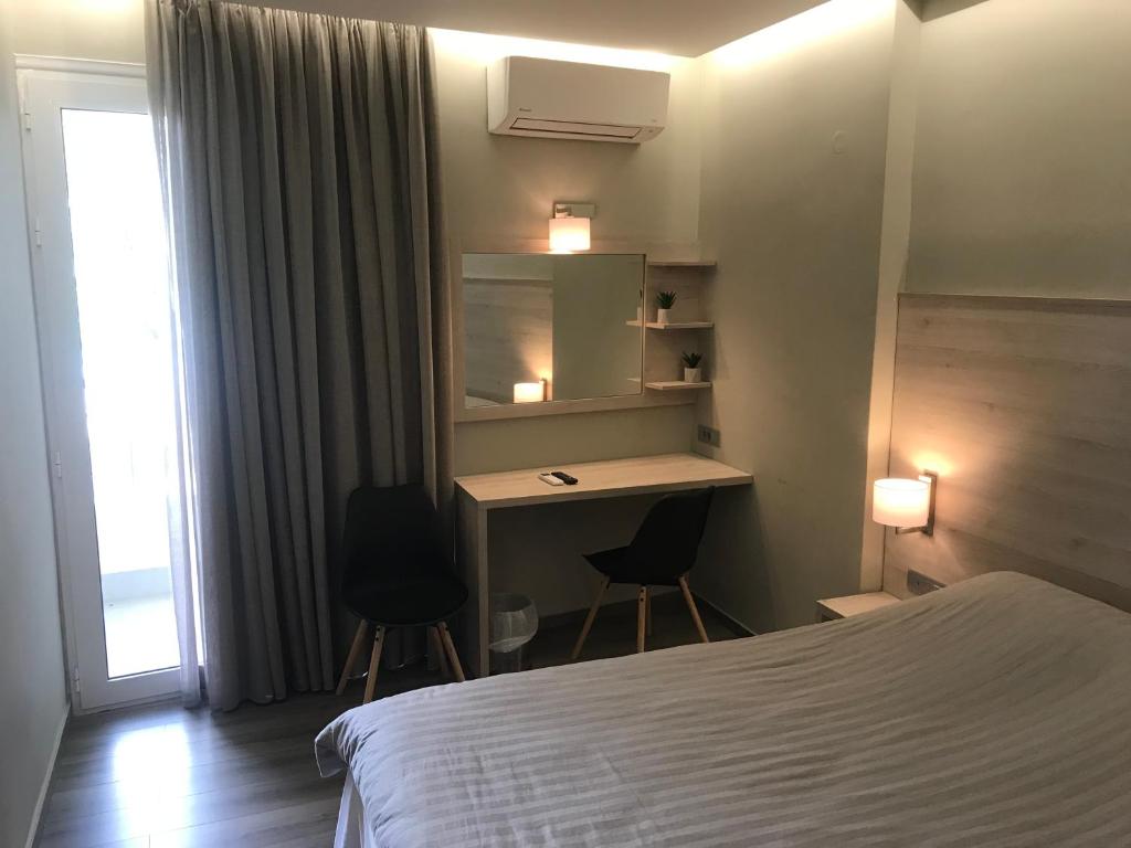 Postel nebo postele na pokoji v ubytování Plaza Hotel