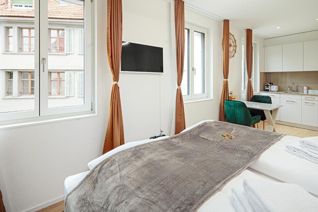 TV a/nebo společenská místnost v ubytování EH Apartments Merkur
