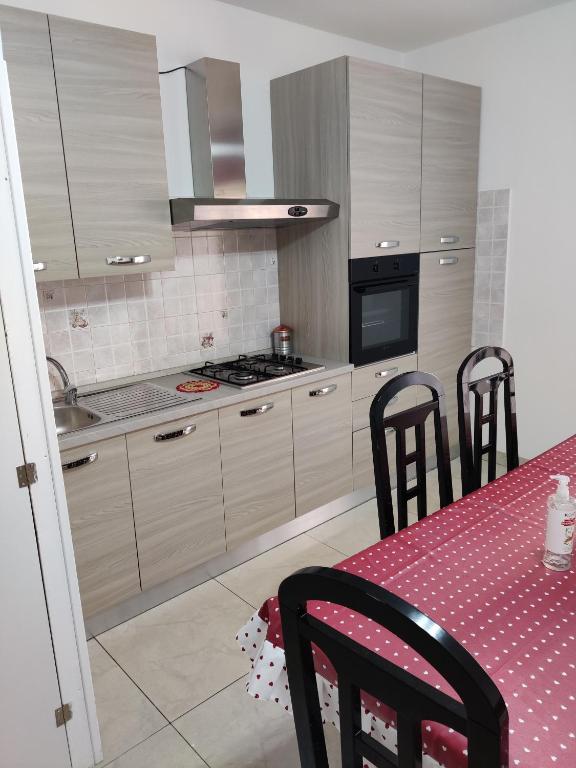 Kuchyň nebo kuchyňský kout v ubytování B&B Planet