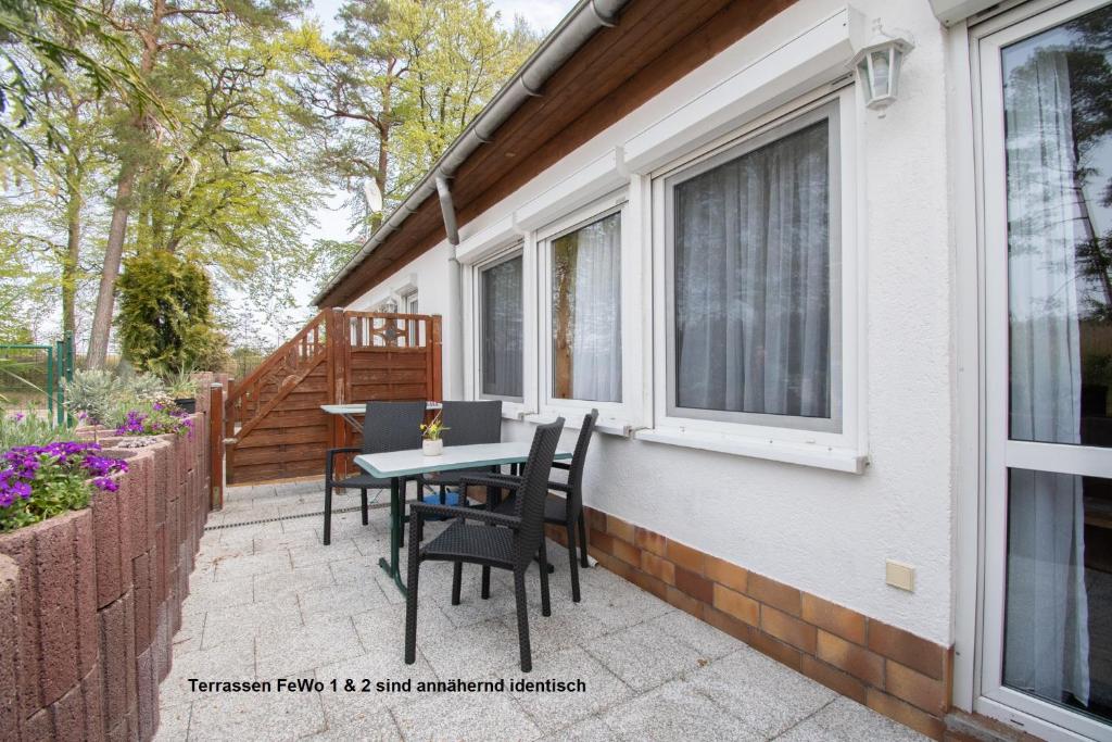 Balkón nebo terasa v ubytování Dünenhaus Fewos - Zum Strand 50m