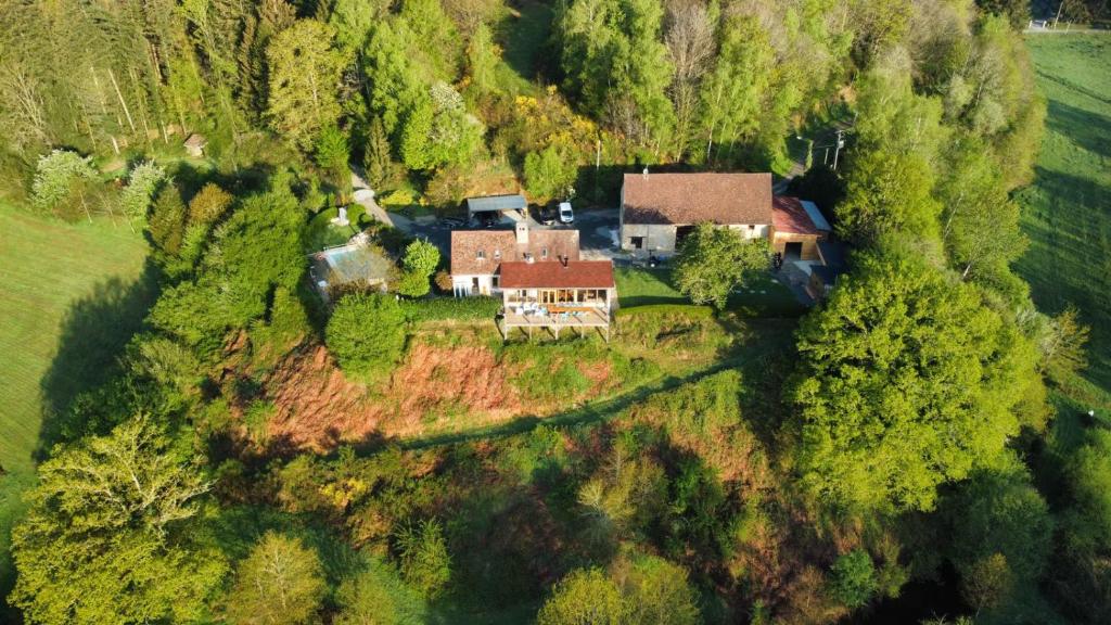 an aerial view of a house on a hill at Veyrinas 43 in Saint-Yrieix-la-Perche