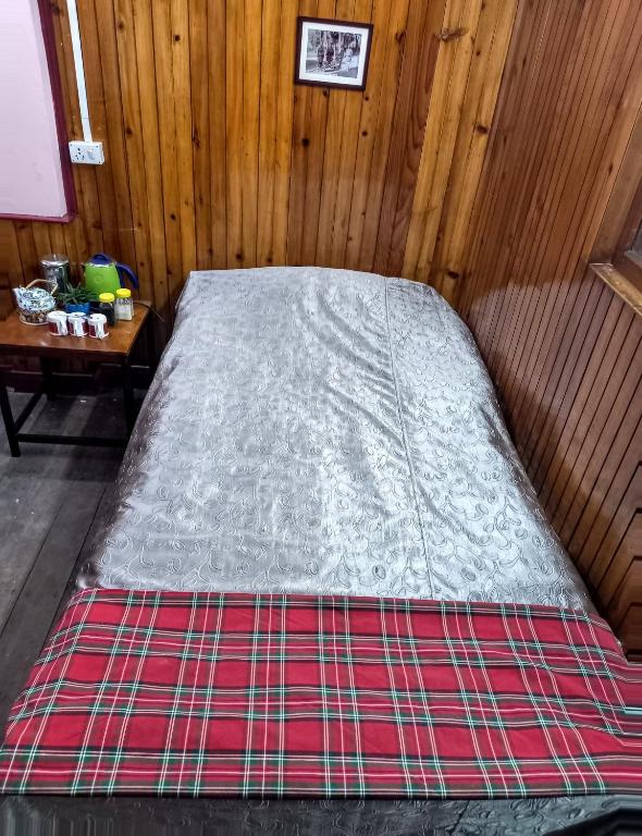 Postel nebo postele na pokoji v ubytování West Point Backpackers Hostel