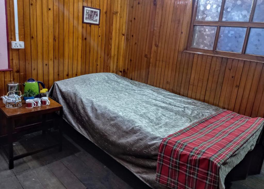 Postel nebo postele na pokoji v ubytování West Point Backpackers Hostel
