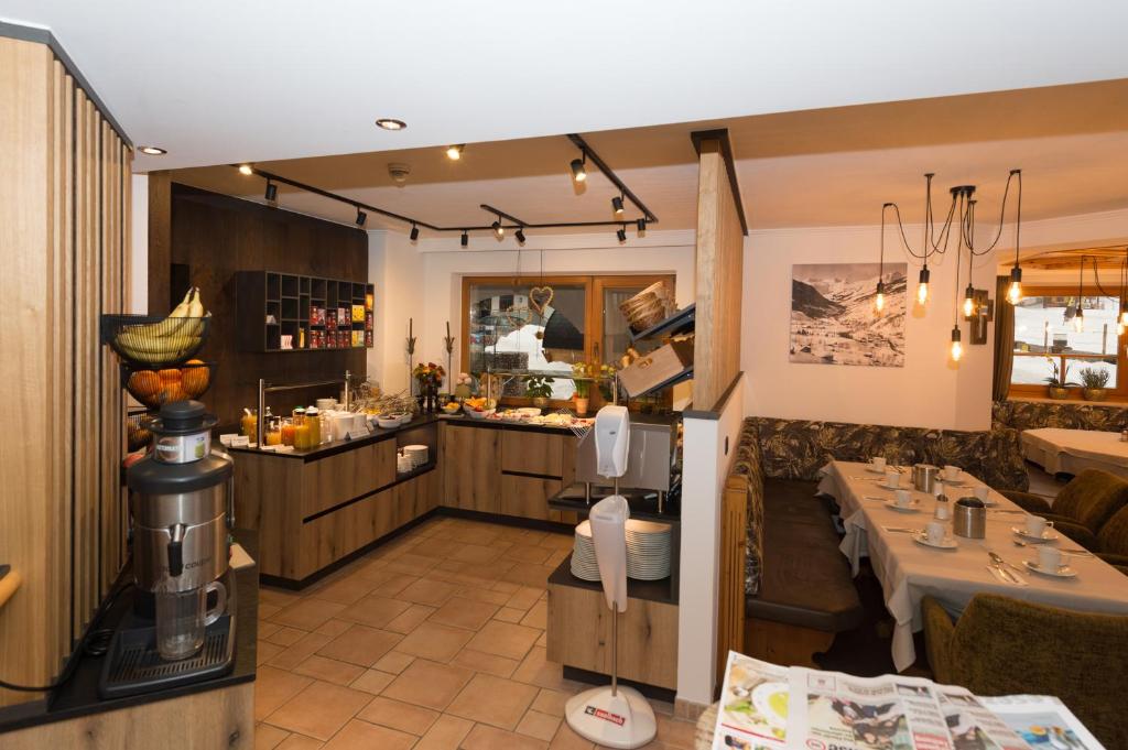 Kuchyň nebo kuchyňský kout v ubytování Hotel Tristkogel