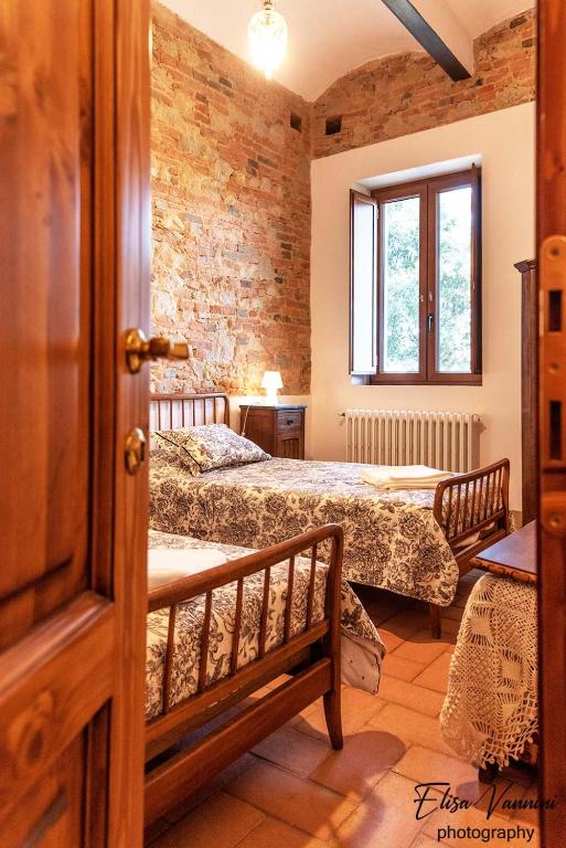 Postel nebo postele na pokoji v ubytování Partino ArtHouse