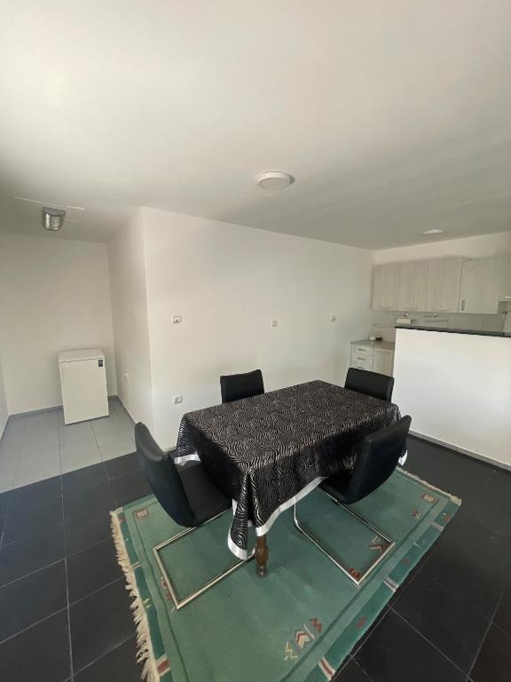 Kuchyň nebo kuchyňský kout v ubytování Vulsa Apartmani