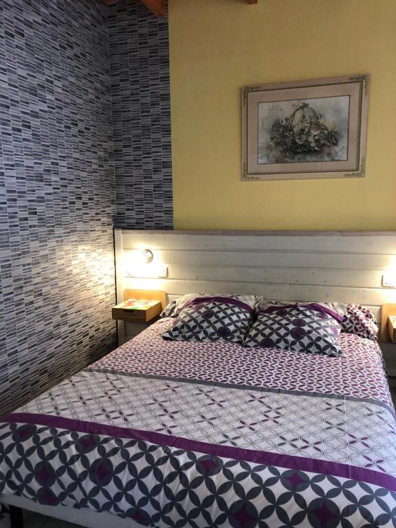 Voodi või voodid majutusasutuse Domaine de l'île - Gîtes et chambres d'hôtes toas