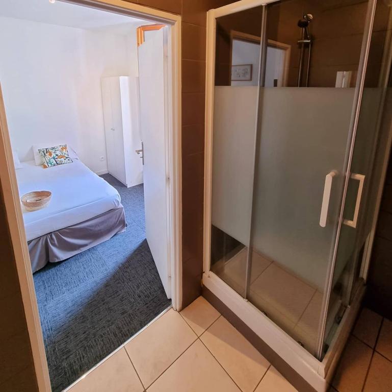 Postel nebo postele na pokoji v ubytování Le Terminus
