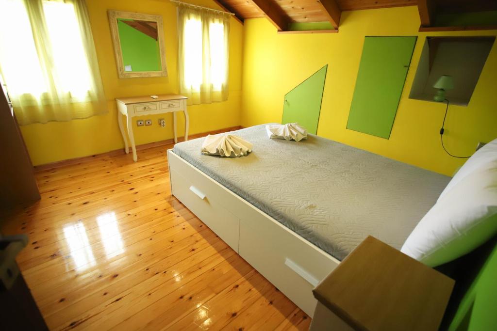 Postel nebo postele na pokoji v ubytování Moon studios