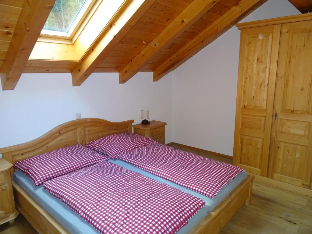 Łóżko lub łóżka w pokoju w obiekcie Appartement Klausner