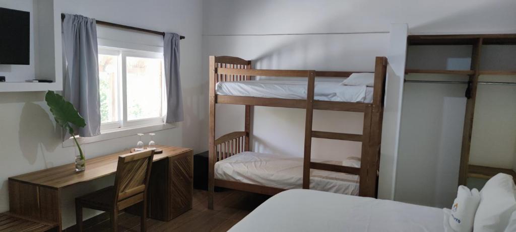 Postel nebo postele na pokoji v ubytování Hotel El Quemaito - Luxury Oceanfront Retreat