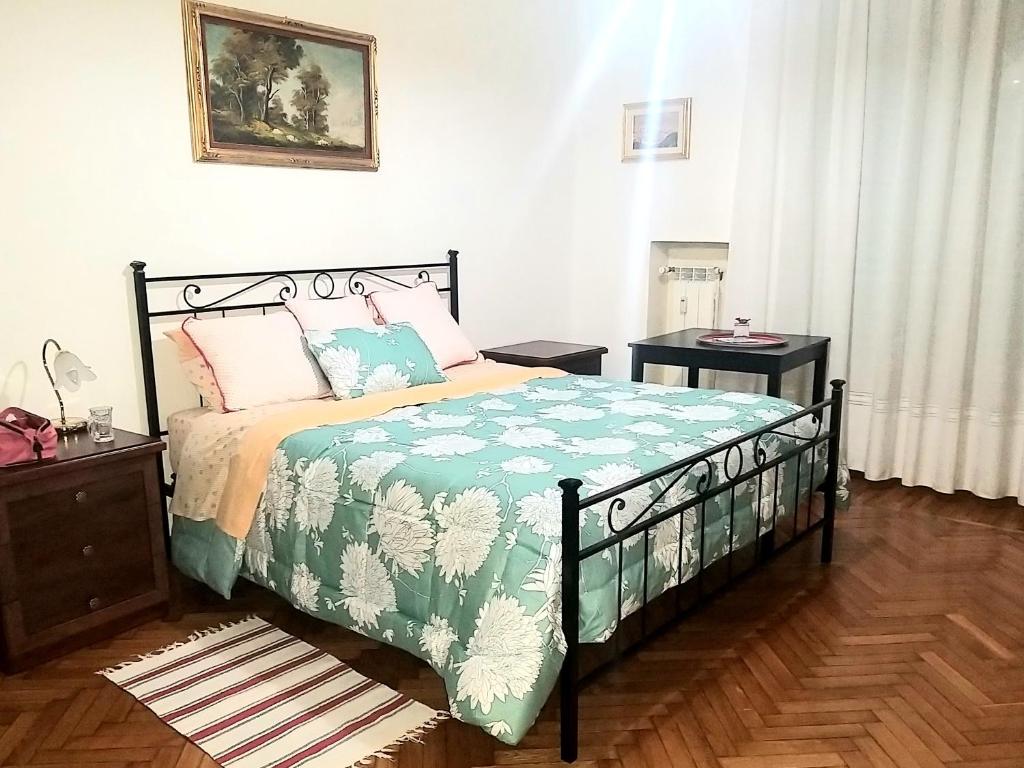 Un pat sau paturi într-o cameră la Amico Del Sole