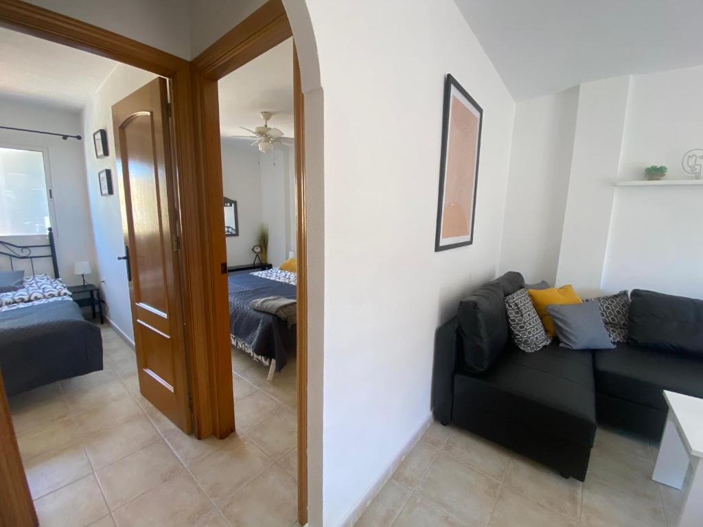Postel nebo postele na pokoji v ubytování Casa de la duna Costa Blanca