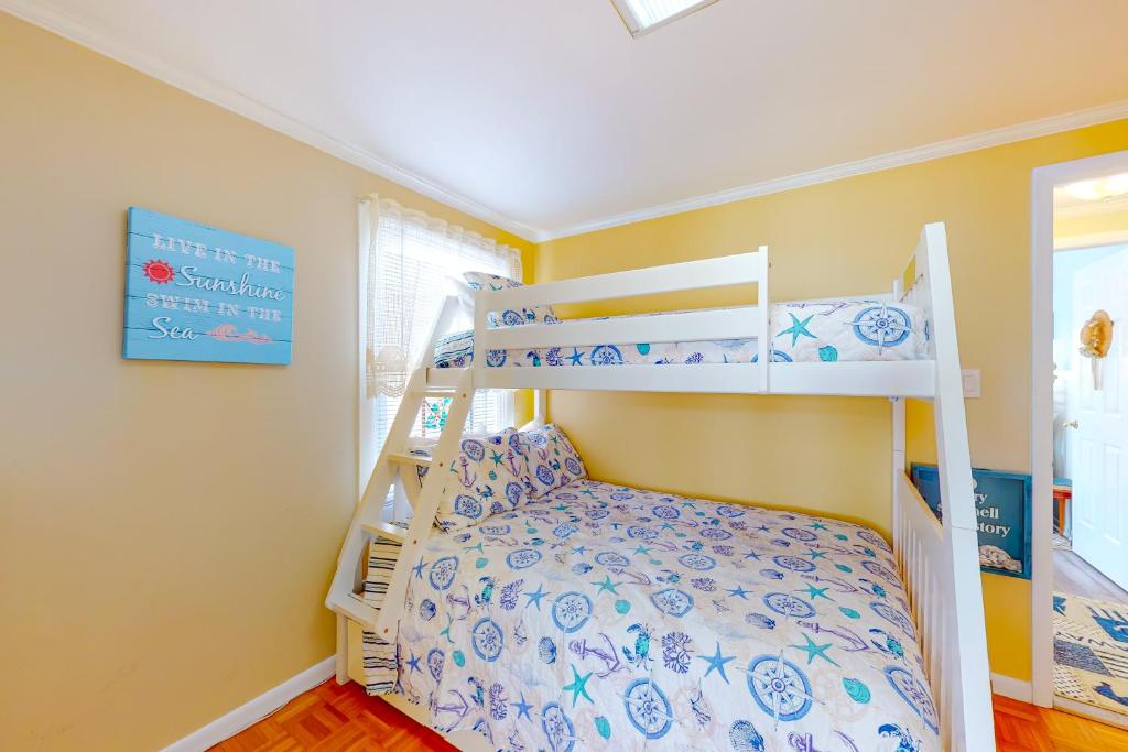 Ein Bett oder Betten in einem Zimmer der Unterkunft Montego Bay - 197 Pine Tree Road