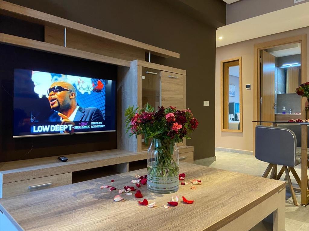TV a/nebo společenská místnost v ubytování Atlas-Résidence by Rent-Inn