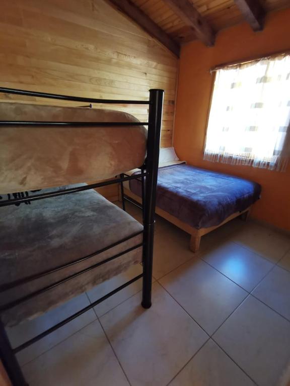 Postel nebo postele na pokoji v ubytování Los Pirineos