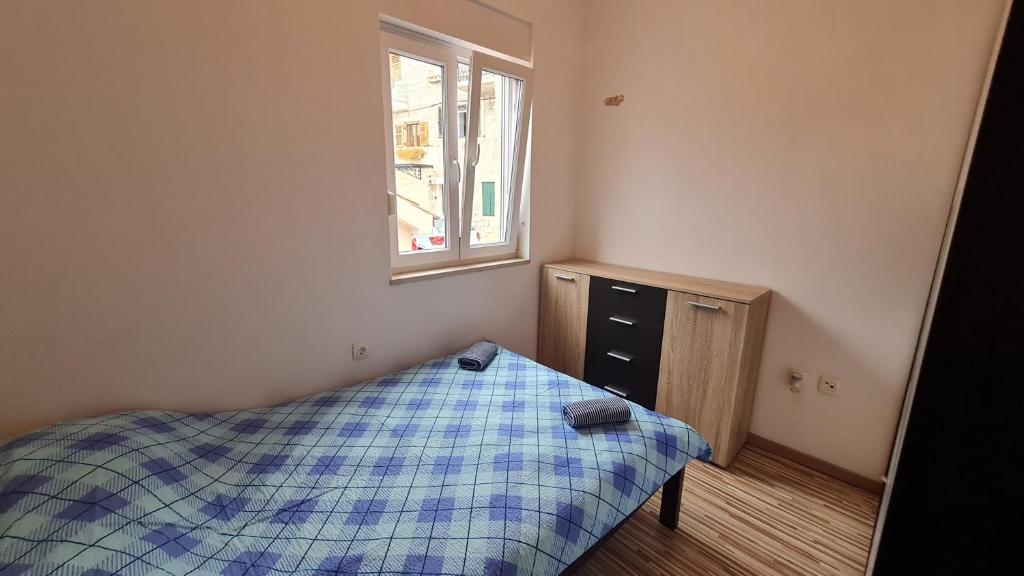 Posteľ alebo postele v izbe v ubytovaní Apartment Sierra