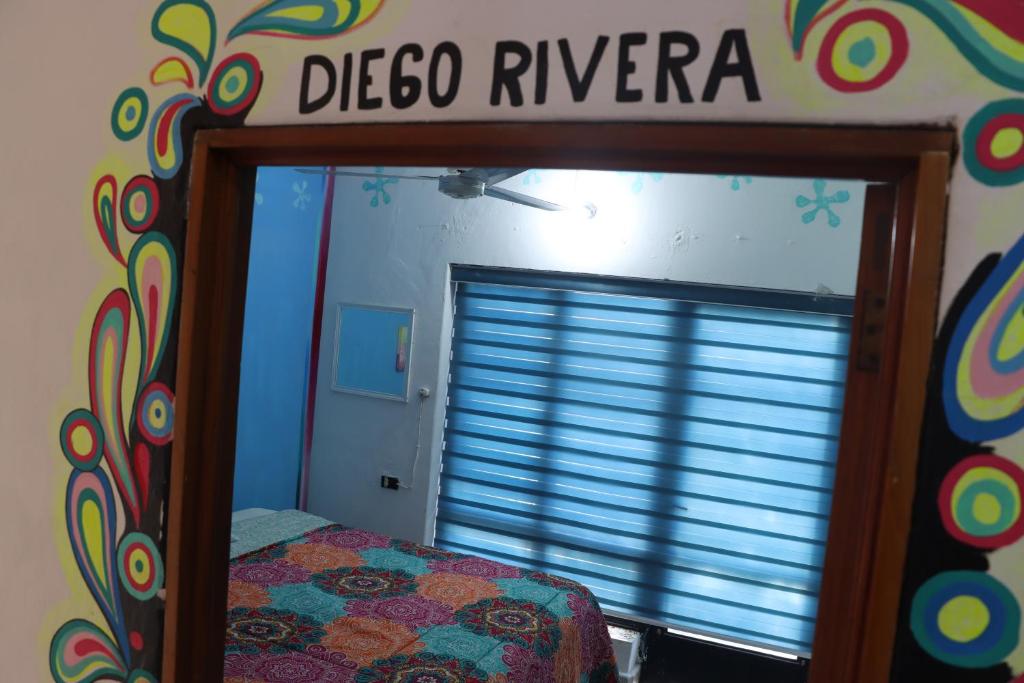 Postel nebo postele na pokoji v ubytování Hostel Vallarta
