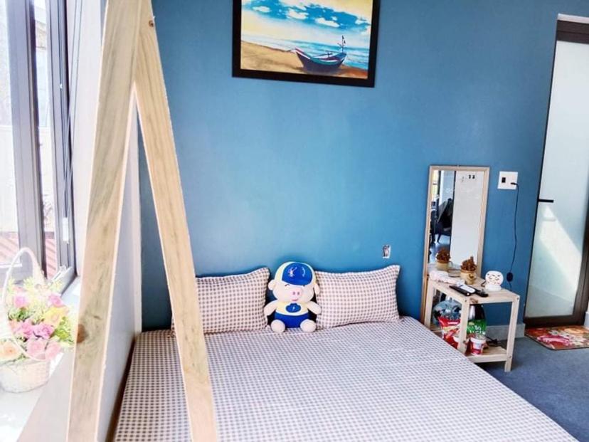 Postel nebo postele na pokoji v ubytování RiverView Homestay 2