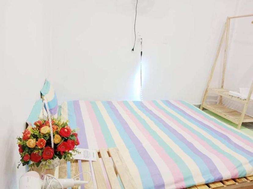 Postel nebo postele na pokoji v ubytování RiverView Homestay 2