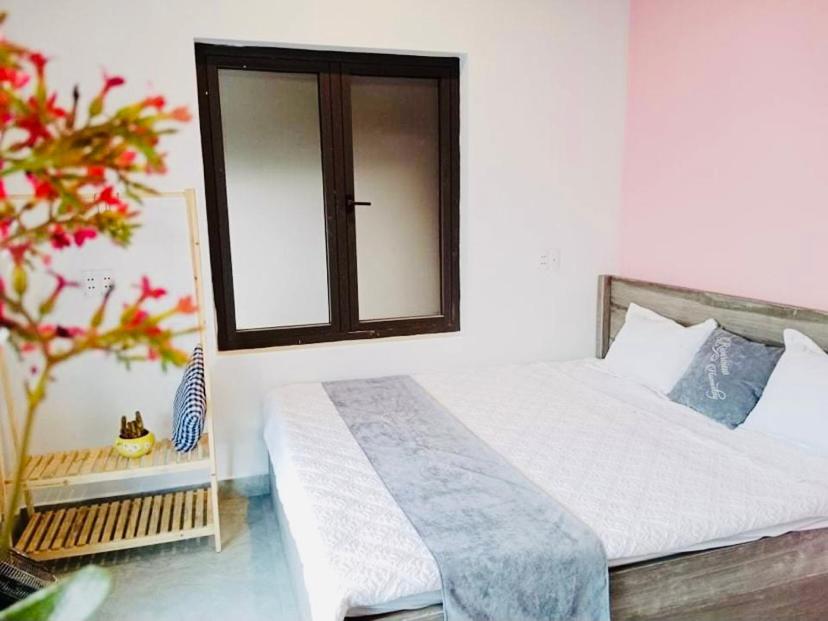 Postel nebo postele na pokoji v ubytování RiverView Homestay 2