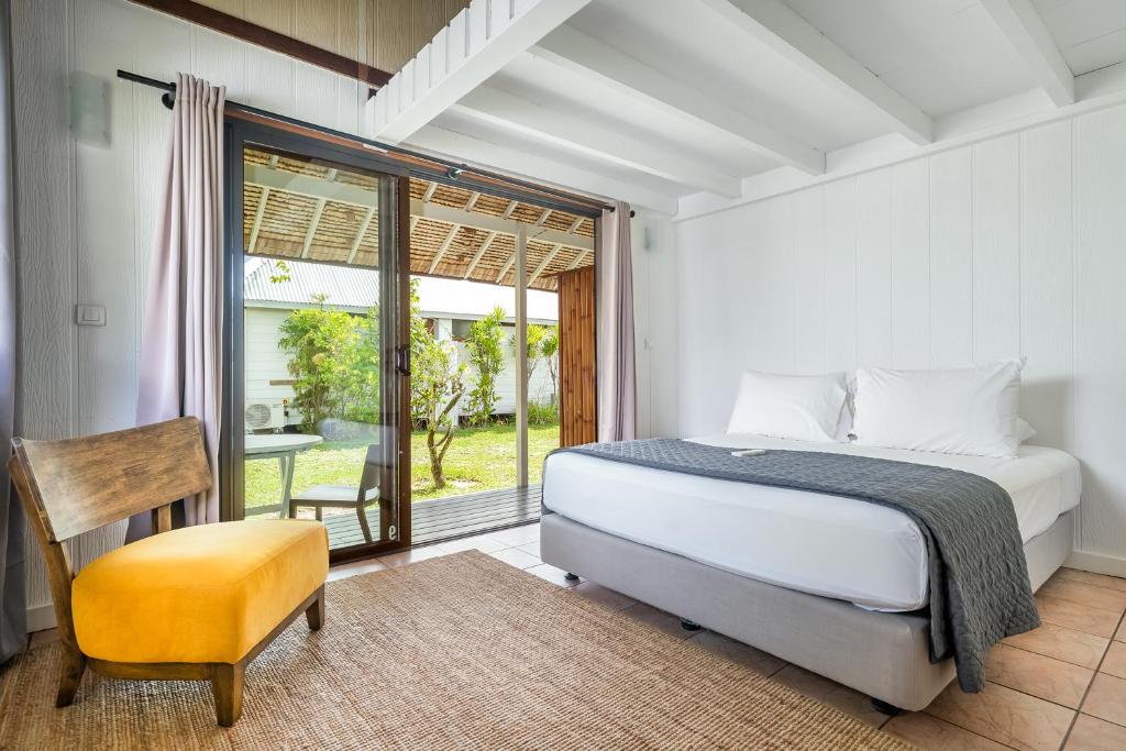 Postel nebo postele na pokoji v ubytování Moorea Island Beach Hotel