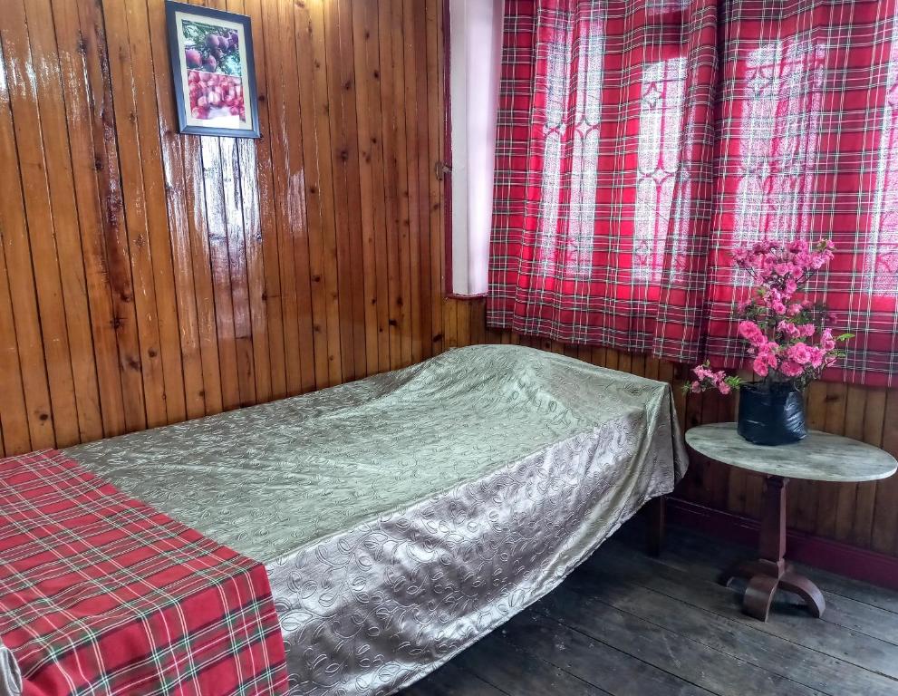 Postel nebo postele na pokoji v ubytování West Point Backpackers Hostel