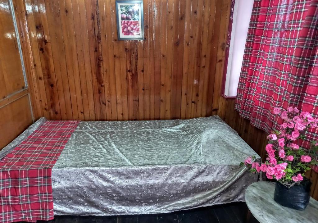 Postel nebo postele na pokoji v ubytování West Point Backpackers Hostel
