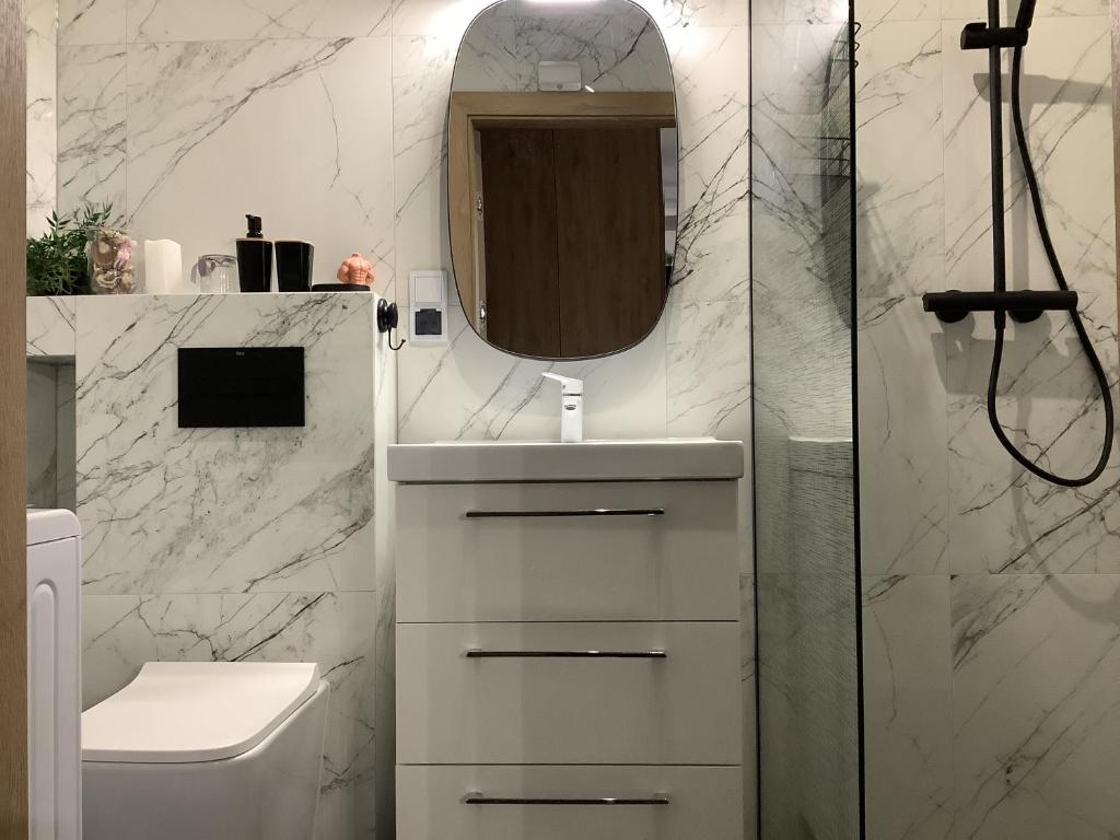 Koupelna v ubytování Apartament Komfortowy - Basen - Perłowa Przystań