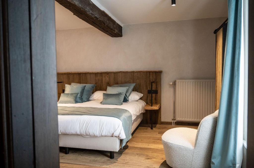 Postel nebo postele na pokoji v ubytování Hotel LEA - Maison Caerdinael