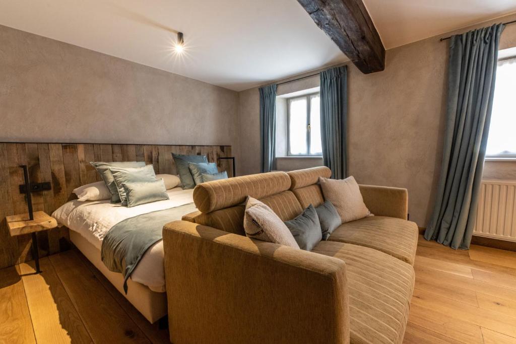 Postel nebo postele na pokoji v ubytování Hotel LEA - Maison Caerdinael