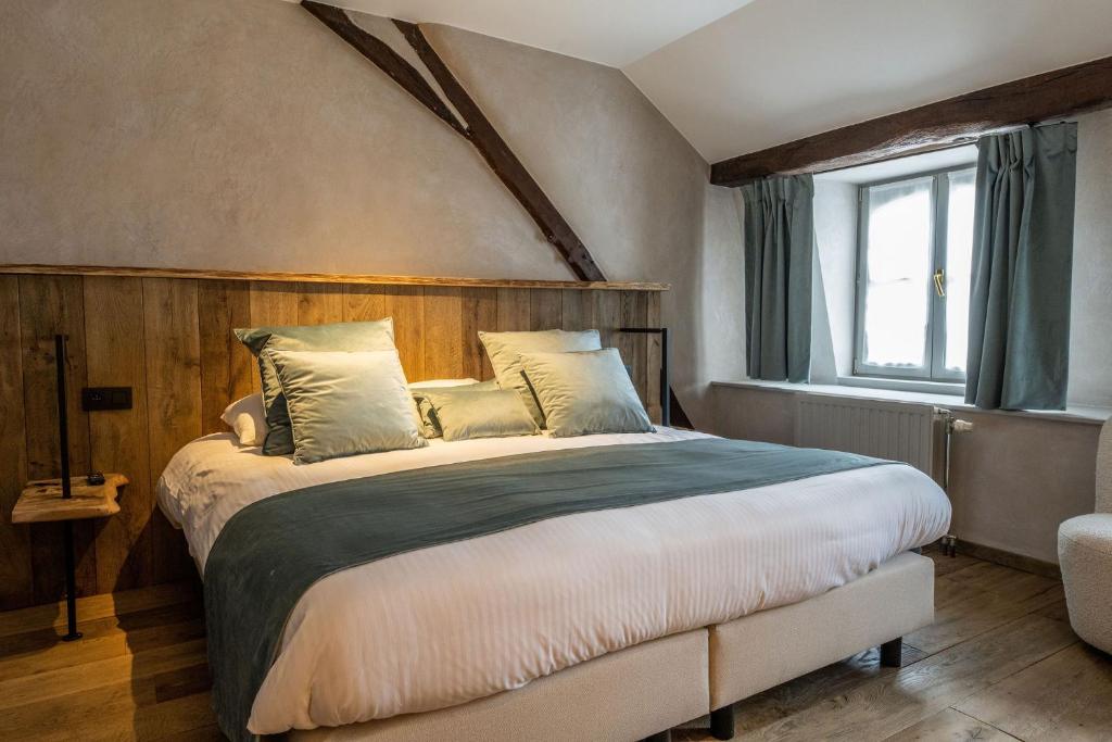 Postel nebo postele na pokoji v ubytování Hotel LEA - Maison Caerdinael