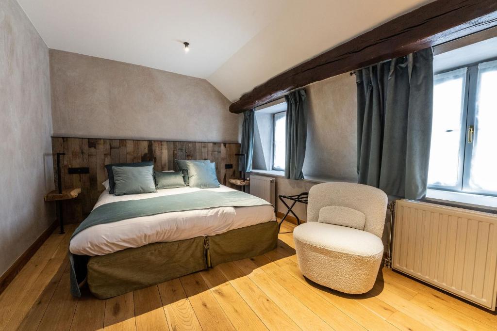 Postel nebo postele na pokoji v ubytování Hotel LEA - Maison Caerdinael