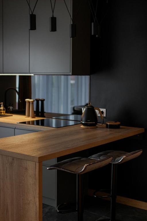 Kuchyňa alebo kuchynka v ubytovaní Apartamenty STUDIO