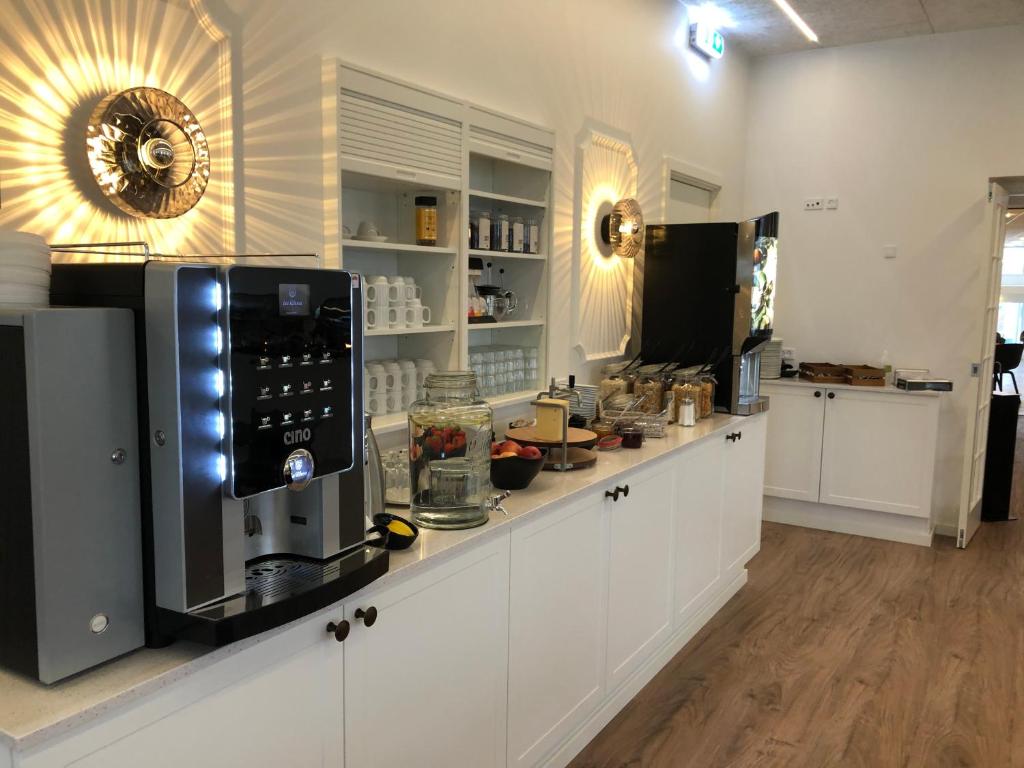 Köök või kööginurk majutusasutuses Hotel Skivehus