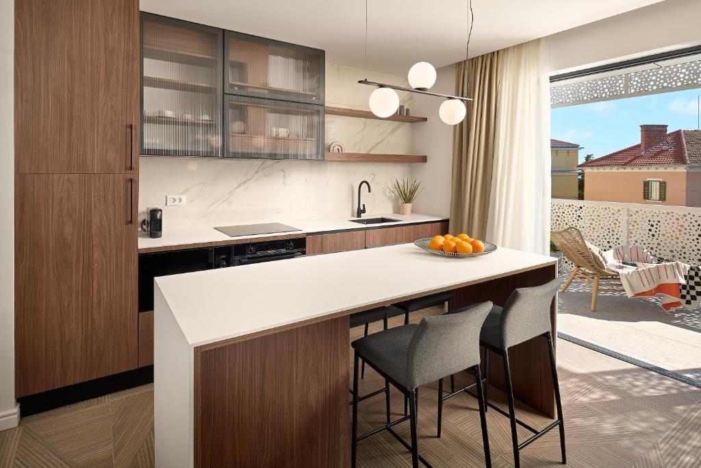 Kuchyň nebo kuchyňský kout v ubytování Luxury Apartments Villa Mala Split