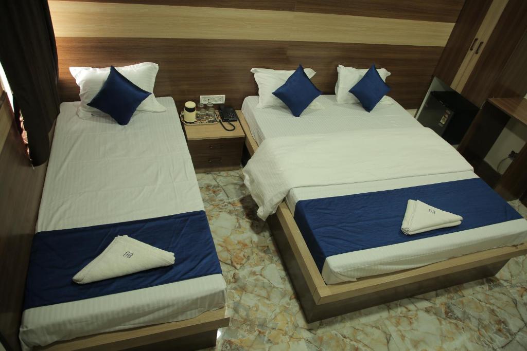 Postel nebo postele na pokoji v ubytování Hotel Best Buy