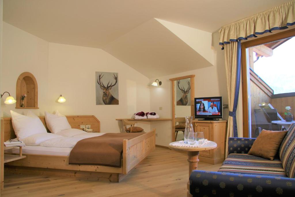 Posezení v ubytování Hotel Alpenrose Dolomites
