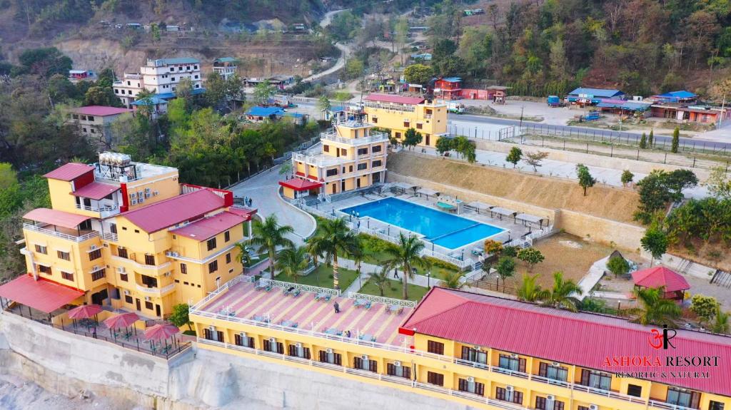 einen Luftblick auf ein Resort mit einem Pool in der Unterkunft Ashoka Resort Pvt. Ltd in Chitwan