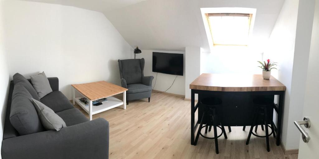 TV a/nebo společenská místnost v ubytování K-Hotel (Grüner Baum)