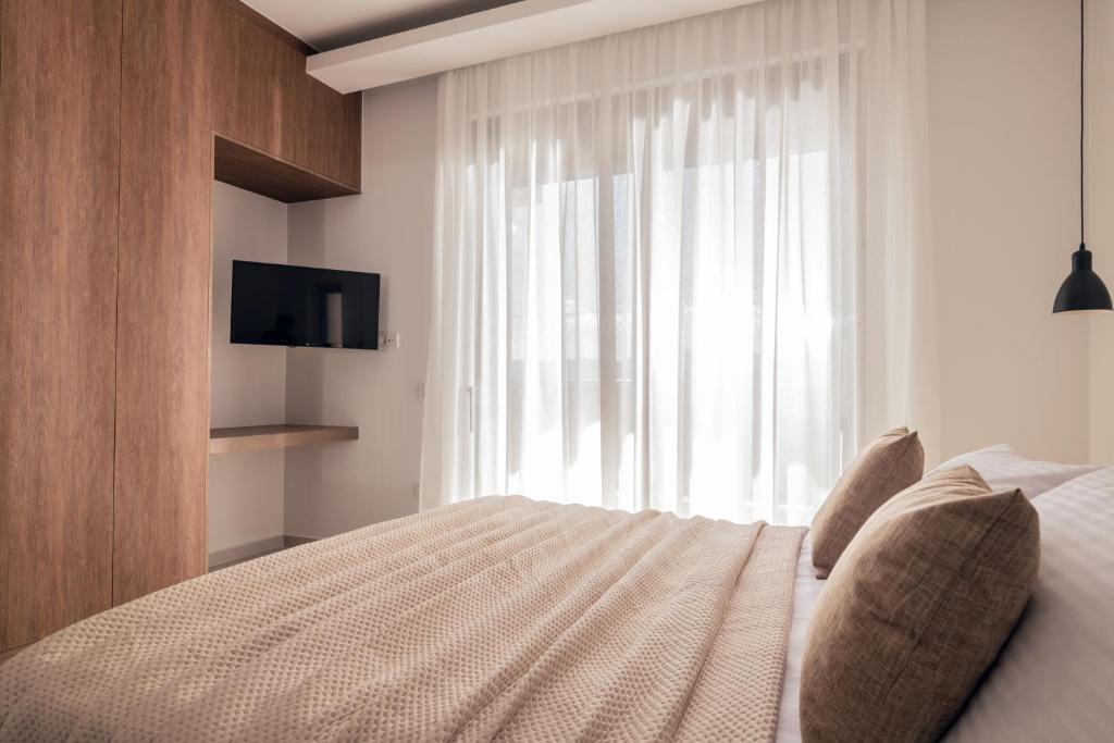 Postel nebo postele na pokoji v ubytování Solis Ortus Villa!
