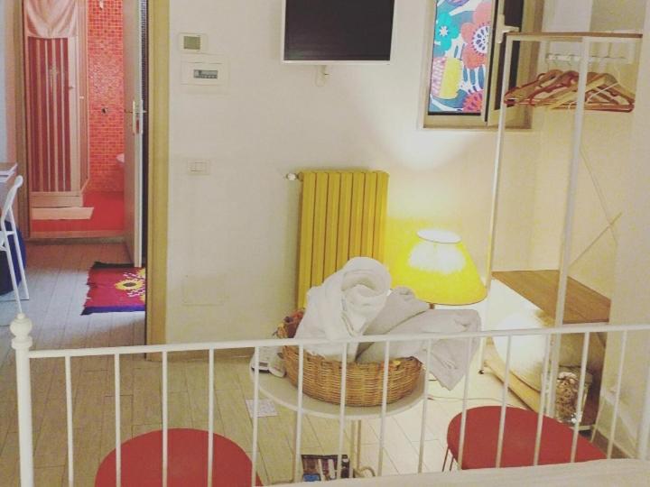 Postel nebo postele na pokoji v ubytování Terrazza Sui Sassi