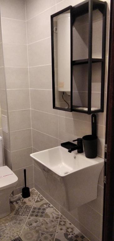 Koupelna v ubytování Draga Apartment
