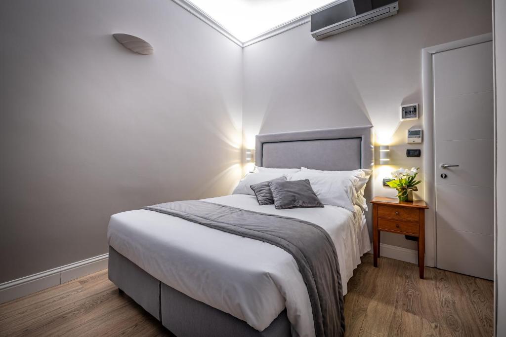 Posteľ alebo postele v izbe v ubytovaní Boutique Hotel Borgo