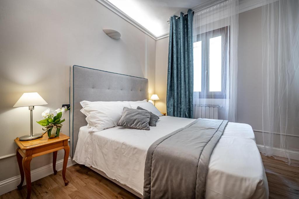 Posteľ alebo postele v izbe v ubytovaní Boutique Hotel Borgo