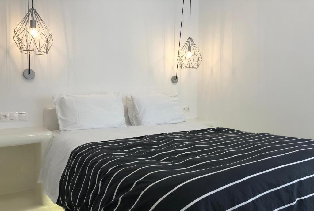 Postel nebo postele na pokoji v ubytování Taki's Guests