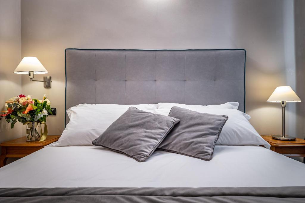 Posteľ alebo postele v izbe v ubytovaní Boutique Hotel Borgo