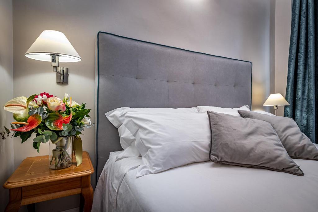 Posteľ alebo postele v izbe v ubytovaní Boutique Hotel Borgo