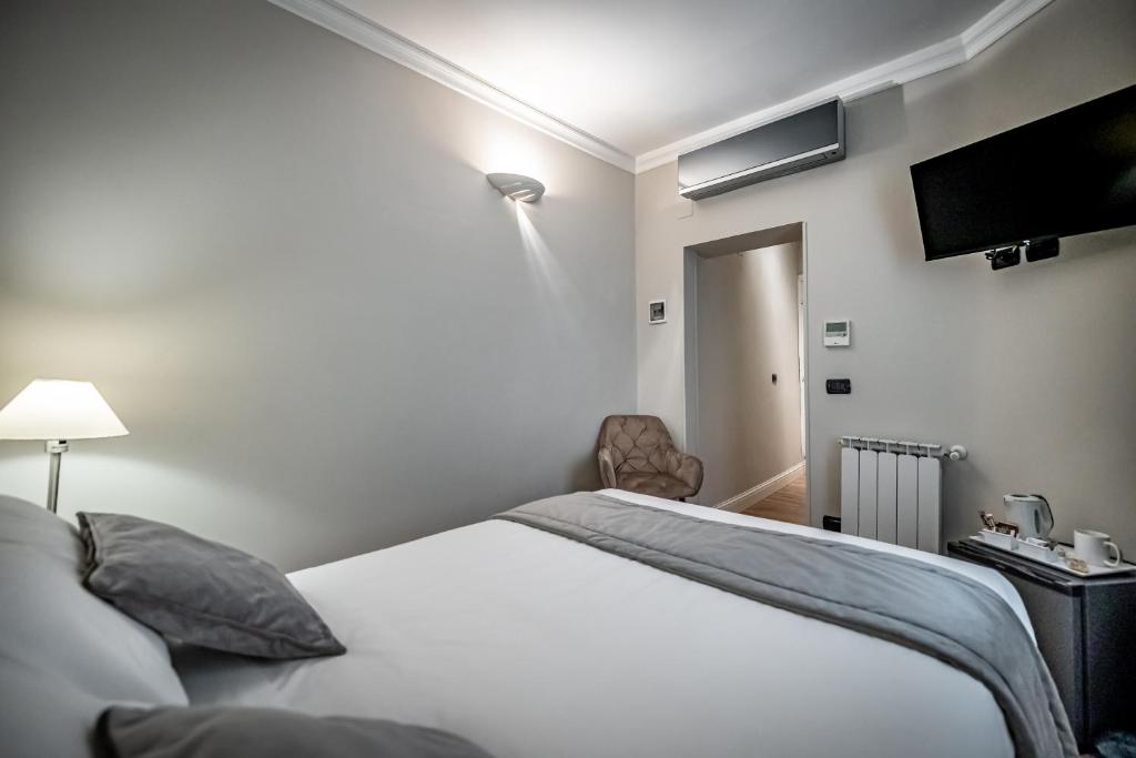 Posteľ alebo postele v izbe v ubytovaní Boutique Hotel Borgo